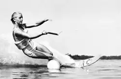 a woman riding a mono waterski slalom-course, Cypress Gardens, Winter Haven, Florida, USA ca. 1950