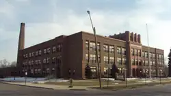 Monroe Middle School (1930), originally the high school, at 503 Washington Street