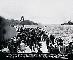 The return of HMS Royal Sovereign's seaman after forced landing under heavy machine gun & rifle fire. (Mudanya, July 1920)