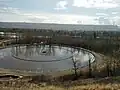 Nautilus Pond from the escarpment with Calgary Olympic Park in the background