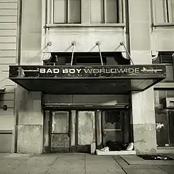 A building with a sign reading "Bad Boy Worldwide" above its entrance