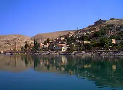 The town of Eski Halfeti (Old Halfeti), partially submerged by the rising waters of the Birecik Dam