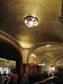 A vaulted ceiling in the promenade at the rear of the auditorium's orchestra level