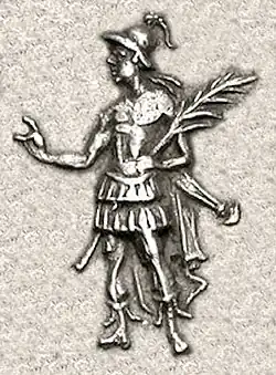 King Nicias in Hellenistic uniform, holding a palm of victory, and making a blessing gesture.