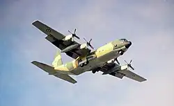 A Nigerian Air Force C-130 gliding in the sky