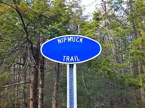 Nipmuck Trail sign on CT-171 outside Bigelow Hollow State Park.