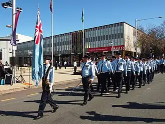 Members of No. 28 Squadron RAAF pass by Civic Square during the unit's Freedom of the City parade in August 2013