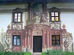 Lüftlmalerei adorning the facade of the Pilatushaus
