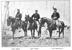 Black and white photo of three officers of the 18th Pennsylvania Cavalry.