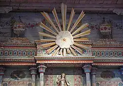 Ojo de Dios, above altar