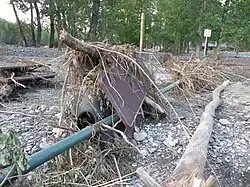 The picnic and day use area of an Okotoks campground, once a grassy meadow, now in some places buried several feet deep in silt and rocks (June 23, 2013)
