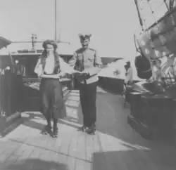 Grand Duchess Olga Nikolaevna of Russia in 1911 roller skating with the help of the officer Pavel Voronov aboard the Standart.