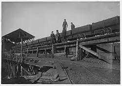 Child laborers on a minecart at Bessie Mine, Alabama, c. 1910-1911. Photo by Lewis Hine.