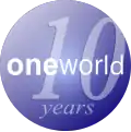 A round blue orb with the text "10 years" printed behind the word Oneworld as a watermark