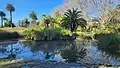 Ornamental lake with Queen Victoria Memorial on the left and Lake Waterfall on the right