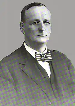 Restored version of 1923 black and white head and shoulders photo of Vermont politician Park H. Pollard.