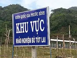 Road sign leading to Bác Ái District