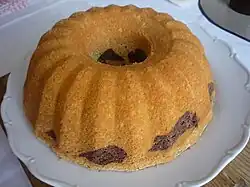 Unfrosted Bundt cake, with almost all of the surface being a uniform color