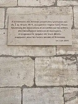 Plaque outside Église Saint-Nizier de Lyon commemorating 50 years