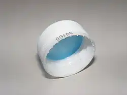 Plastic bottle screw cap used to seal a plastic bottle.