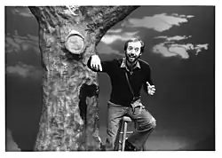 DeSpain telling stories under his signature tree on "Pleasant Journeys", his storytelling show for kids on KING-TV