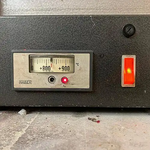 12. Meanwhile, the oven is preheated (in this case to 825&nbsp;°C).