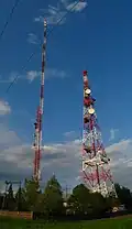Front, right: steel lattice, communications tower; Middle, left: „old”, second mast — 102m; Rear, center: main mast — 331m