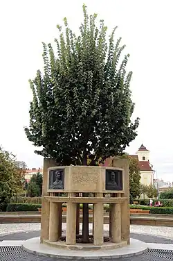 Vojáček family monument in front of the National House in Prostějov