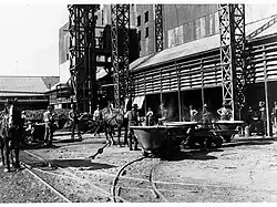 BHP, Port Pirie, Slag pots outside smelter building, c.1915
