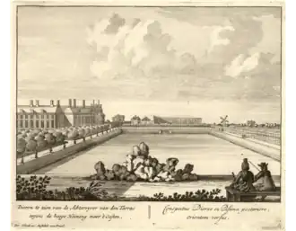 View of the garden side of the house and the pond