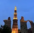 Qutub Minar illuminated at night