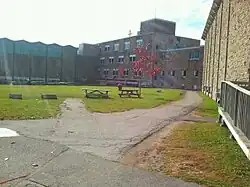 The old courtyard behind the school. The original building with the chapel and single gym, is visible.