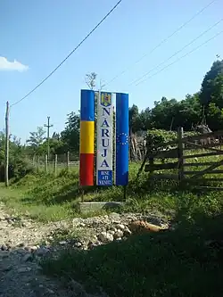 Entrance sign to the commune