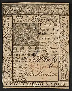 A twenty-shilling Delaware banknote issued in 1776 with the inscription: "TWENTY SHILLINGS. THIS Indented Bill shall pass current for Twenty Shillings, according to an Act of General Assembly of the Counties of Newcastle, Kent and Sussex, upon Delaware, passed in the 15th Year of the Reign of His Majesty Geo. the 3d. Dated the 1st Day of Jan. 1776. XXs." ; Borders contain: "Twenty Shillings" ; Verso: "To Counterfeit is Death. Printed by JAMES ADAMS, 1776."