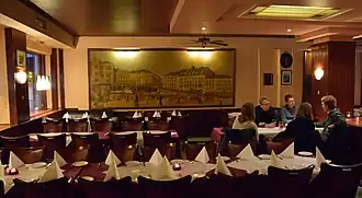 Tables towards the windows, with the picture of Youngstorget.