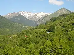 View of Ribnica and Tanuše villages with peaks and mountain pass of Korabska Vrata in background