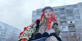 Screenshot from the music video of "Big"