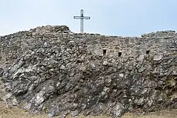 Christian cross at the peak of Rocca di Manerba del Garda