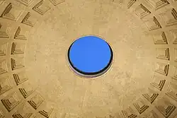Close interior photo of the Pantheon's circular oculus opening at the center of the domed ceiling