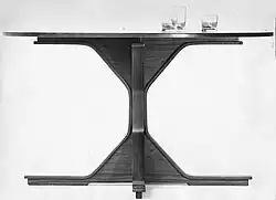 Rosewood circular table designed for Bernini in (1960)