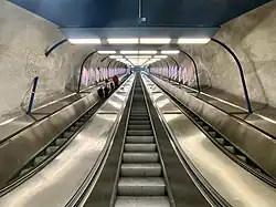 Metro station escalators