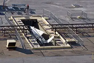 Missile emerging from underground storage