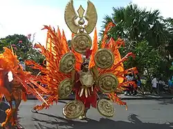 A costumed carnival dancer.