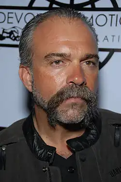Sam Childers arriving at a book signing of Another Man's War
