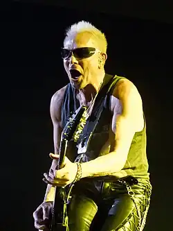 Schenker performing in 2014