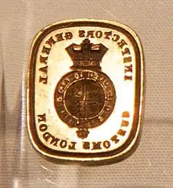 Rectangular seal with reversed customs notice and royal warrant