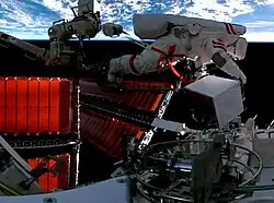 Astronaut Fei Junlong performing spacewalk on Tiangong Space Station