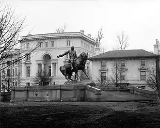 Photograph of a sculpture depicting a man riding a horse