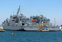 USNS Amelia Earhart&nbsp;(T-AKE-6) dockside beside USNS Robert E. Peary&nbsp;(T-AKE-5)