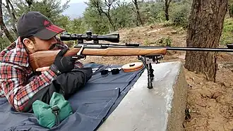 Shooter taking aim with his IOF .30-06 Sporting Rifle with Tasco 3-9x 40 mm Riflescope and Haris Bipod mounted at a private range in J&K, India
